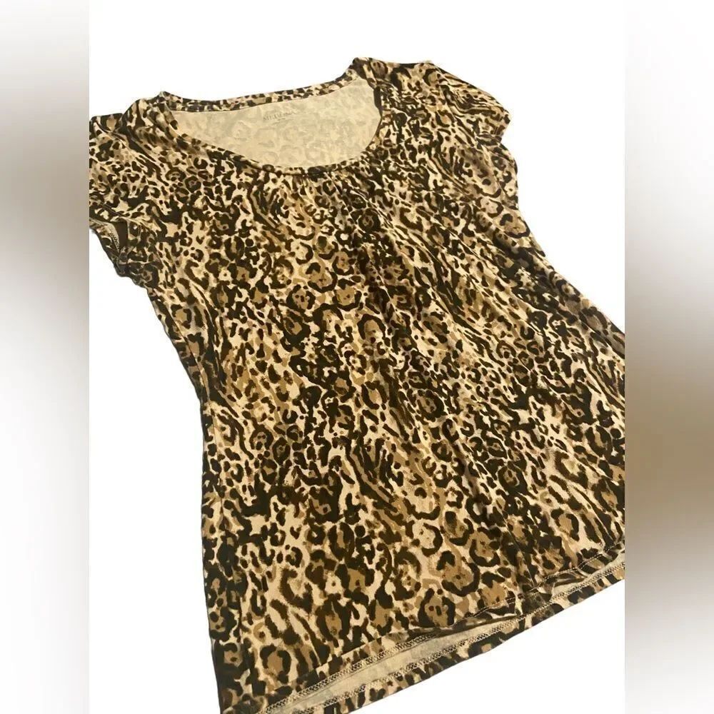 Merina size medium leopard top excellent condition